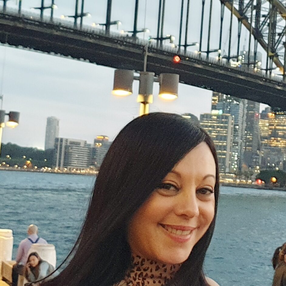 Anna Parisi in front of the Sydney Harbour Bridge